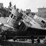 The Eastland ship being righted after the Eastland Disaster